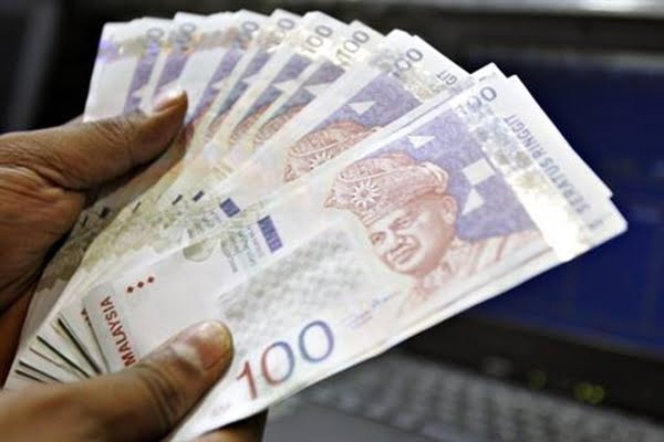 Ringgit opens weaker as global central banks raise interest rates
